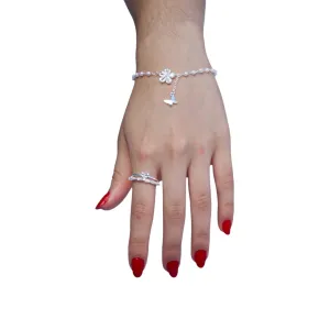 PULSEIRA PÉROLA COM FLOR EM NAVETE CRISTAL E BORBOLETA LISA PENDURADA E EXTENSOR - BANHADO A PRATA 925