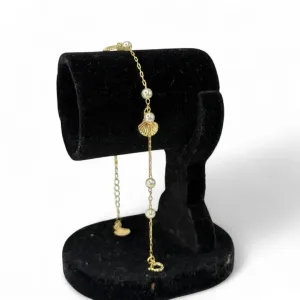 PULSEIRA COM PENDURICALHO CONCHA E PÉROLA E EXTENSOR - BANHADO A OURO 18K