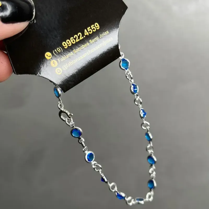 PULSEIRA COM PONTO DE LUZ AZUL ESCURO POR INTEIRO  -PRATA 925