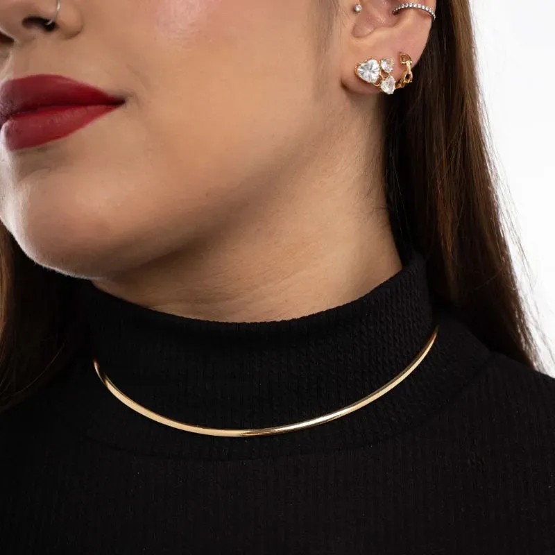 BRINCO FURO DUPLO COM CORAÇÕES CRISTAL- BANHADO A OURO 18K