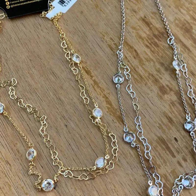 CHOKER DUPLO CORRENTE CORAÇÃO COM CORRENTE ELO PORTUGUÊS FINO E PONTO DE LUZ CRISTAL - BANHADO A OURO 18K CHOKER DUPLO CORRENTE CORAÇÃO COM CORRENTE ELO PORTUGUÊS FINO E PONTO DE LUZ CRISTAL - BANHADO A OURO 18K