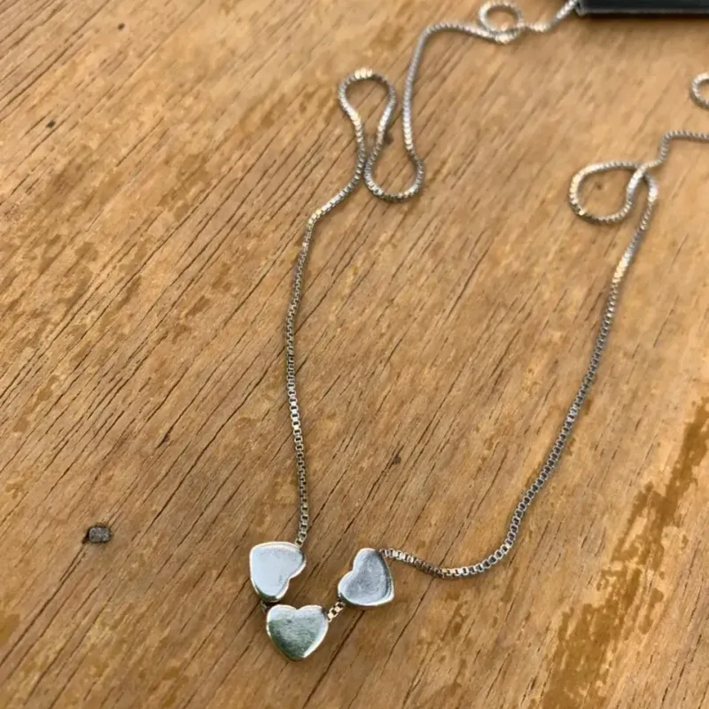 CORRENTE CORAÇÃO MINI TRIPLO CHEIO SIMPLES  - BANHADO A RÓDIO BRANCO CORRENTE CORAÇÃO MINI TRIPLO CHEIO SIMPLES  - BANHADO A RÓDIO BRANCO