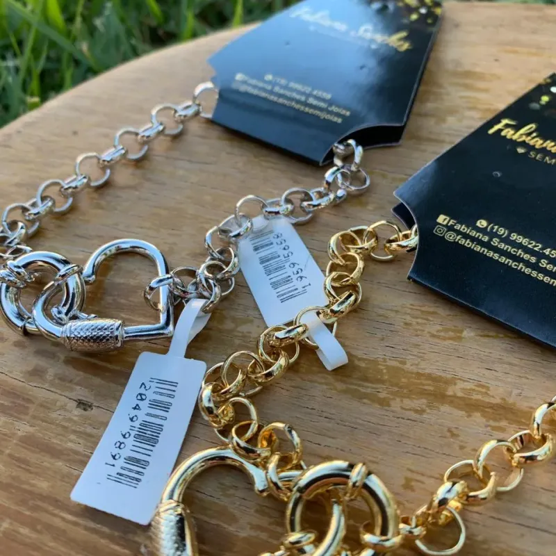 PULSEIRA ELO PORTUGUÊS  GROSSO FECHO BOIA COM CORAÇÃO VAZADO PENDURADO- BANHADO A RÓDIO BRANCO PULSEIRA ELO PORTUGUÊS  GROSSO FECHO BOIA COM CORAÇÃO VAZADO PENDURADO- BANHADO A RÓDIO BRANCO