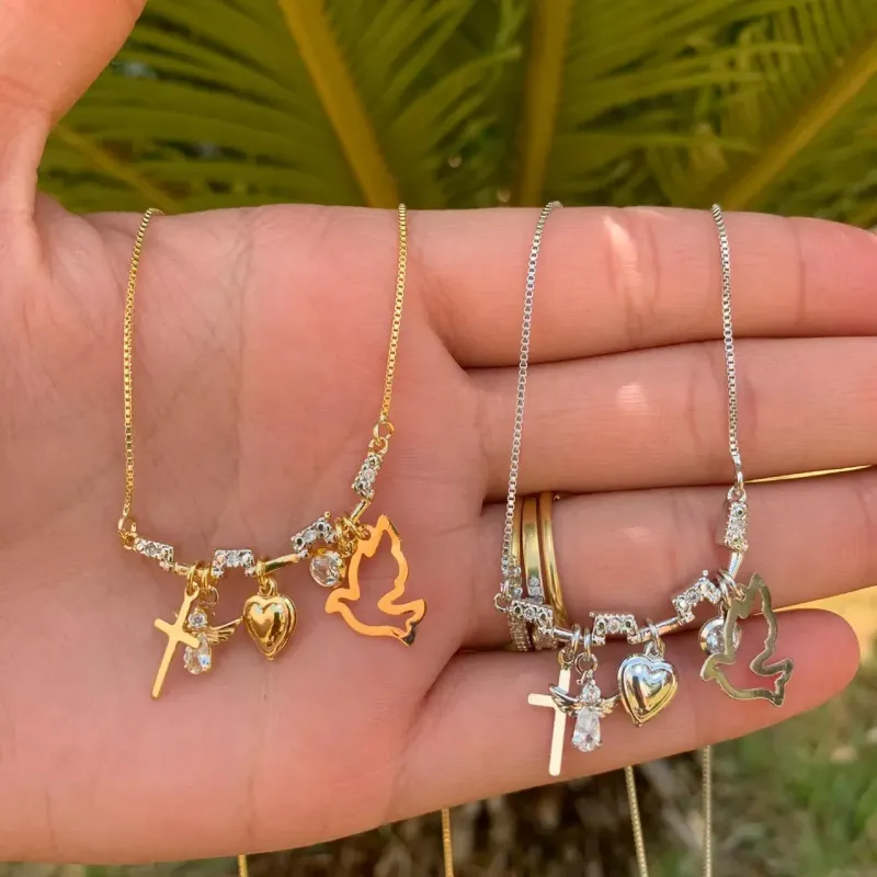 CORRENTE CANGA ESPÍRITO SANTO,CRUZ,ANJO,CORAÇÃO CRAVEJADO COM EXTENSOR- BANHADO A RÓDIO BRANCO CORRENTE CANGA ESPÍRITO SANTO,CRUZ,ANJO,CORAÇÃO CRAVEJADO COM EXTENSOR- BANHADO A RÓDIO BRANCO