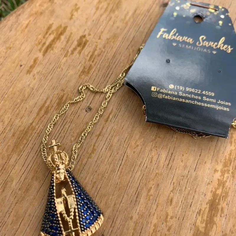 CORRENTE NOSSA SENHORA GRANDE COM SINGAPURA 50CM - BANHADO A OURO 18K CORRENTE NOSSA SENHORA GRANDE COM SINGAPURA 50CM - BANHADO A OURO 18K