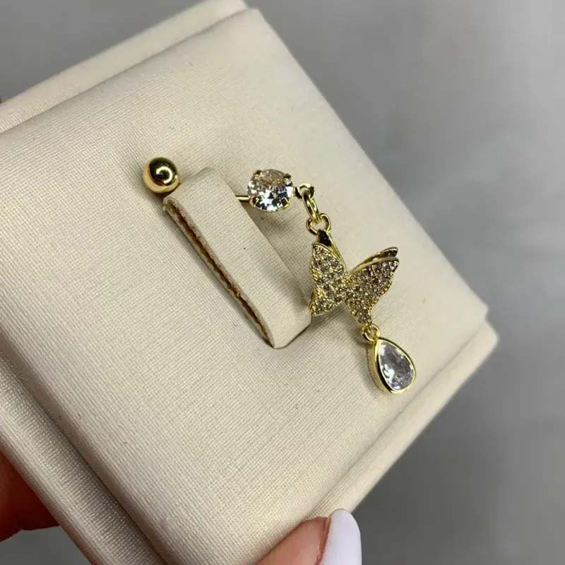 PIERCING DE UMBIGO BOLINHA E BORBOLETA PENDURADO E GOTA  ZIRCONIA  - BANHADO A OURO 18K PIERCING DE UMBIGO BOLINHA E BORBOLETA PENDURADO E GOTA  ZIRCONIA  - BANHADO A OURO 18K