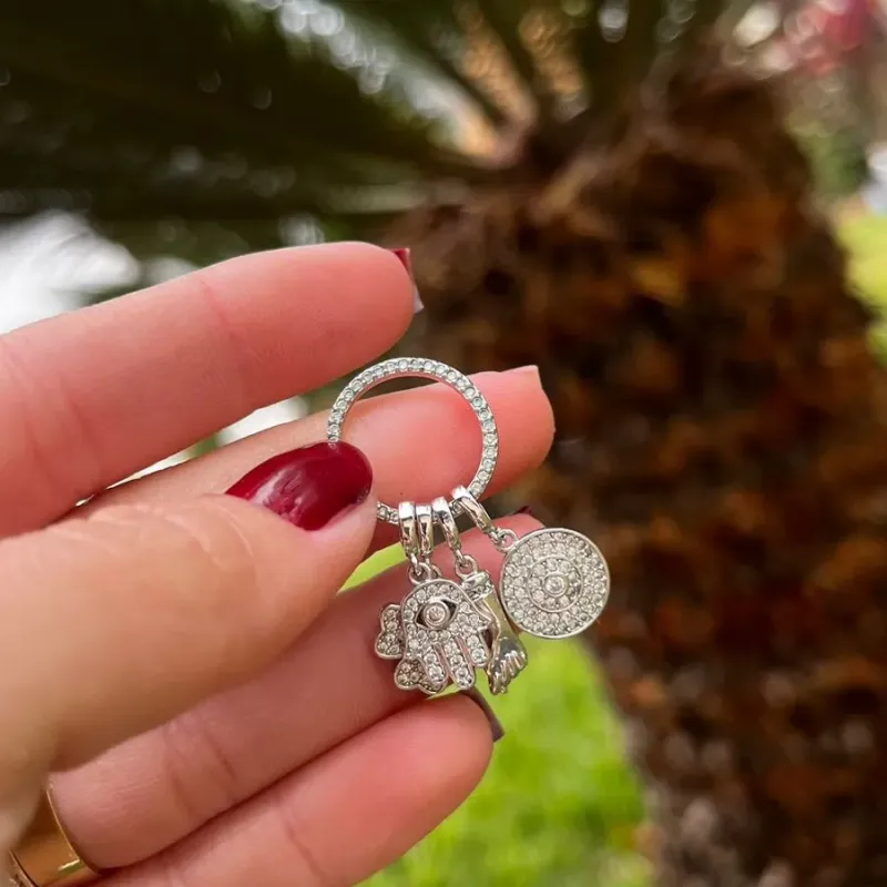 CORRENTE PATUÁ CRAVEJADO, MAO DE FATIMA, OLHO GREGO,FIGA, E TREVO  - BANHADO A RÓDIO BRANCO CORRENTE PATUÁ CRAVEJADO, MAO DE FATIMA, OLHO GREGO,FIGA, E TREVO  - BANHADO A RÓDIO BRANCO