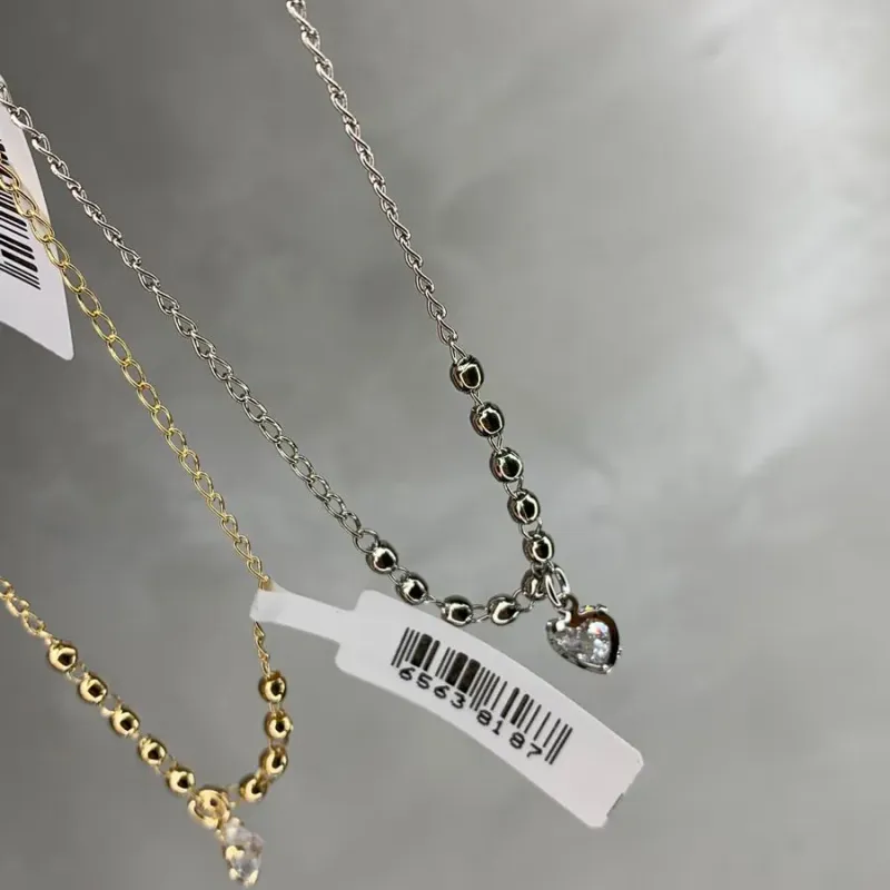 TORNOZELEIRA BOLINHAS LISA COM CORAÇÃO ZIRCONIA PENDURADO COM EXTENSOR- BANHADO A RÓDIO BRANCO TORNOZELEIRA BOLINHAS LISA COM CORAÇÃO ZIRCONIA PENDURADO COM EXTENSOR- BANHADO A RÓDIO BRANCO