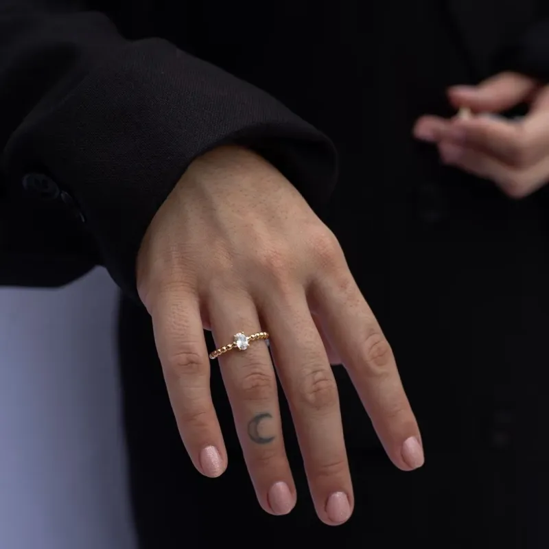 ANEL SOLITÁRIO ZIRCONIA OVAL ARO COM DETALHES EM BOLINHAS  Nº18  - BANHADO A OURO 18K ANEL SOLITÁRIO ZIRCONIA OVAL ARO COM DETALHES EM BOLINHAS  Nº18  - BANHADO A OURO 18K