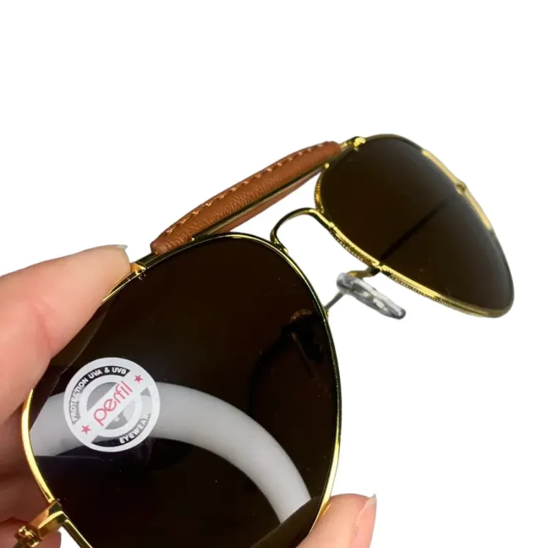 ÓCULOS FEMININO AVIADOR COM LENTE MARRON COM DETALHES EM COURO -LENTE NÃO POLARIZADA ÓCULOS FEMININO AVIADOR COM LENTE MARRON COM DETALHES EM COURO -LENTE NÃO POLARIZADA