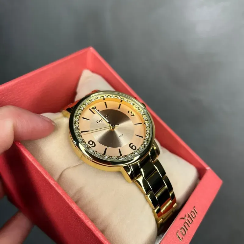 RELÓGIO CONDOR FEMININO DOURADO COM FUNDO ROSÉ E ZIRCONIA LATERIAS  CO2035NAJ4J- COR DOURADA RELÓGIO CONDOR FEMININO DOURADO COM FUNDO ROSÉ E ZIRCONIA LATERIAS  CO2035NAJ4J- COR DOURADA