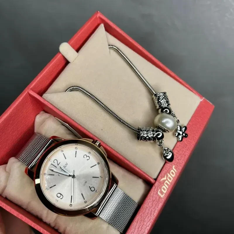 RELÓGIO CONDOR FEMININO PULSEIRA ESTEIRA PRATA E FUNDO ROSÉ -BRINDE PULSEIRA  CO2035NBAK4J  - COR PRATA RELÓGIO CONDOR FEMININO PULSEIRA ESTEIRA PRATA E FUNDO ROSÉ -BRINDE PULSEIRA  CO2035NBAK4J  - COR PRATA