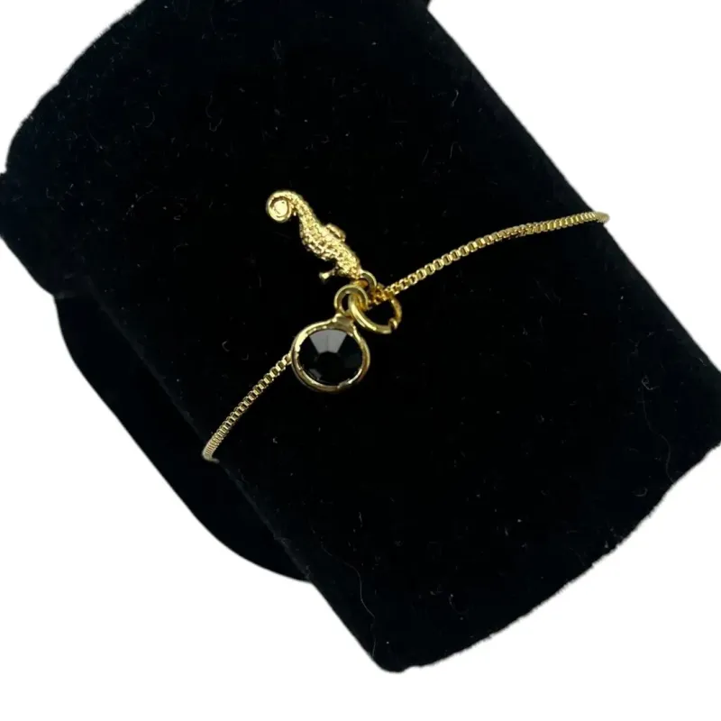 TORNOZELEIRA VENEZIANA COM PINGENTE CAVALO MARINHO E PONTO DE LUZ ACRILICO- BANHADO A OURO 18K TORNOZELEIRA VENEZIANA COM PINGENTE CAVALO MARINHO E PONTO DE LUZ ACRILICO- BANHADO A OURO 18K