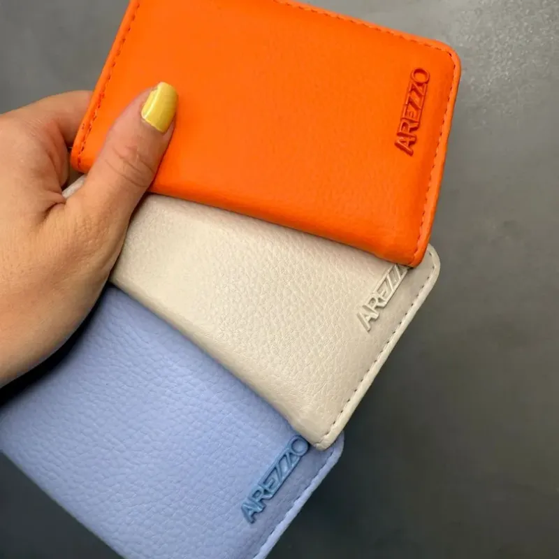 PORTA CARTÃO REPLICA AREZZO COURO SINTETICO LARANJA COM ESCRITO EM METAL POR DENTRO EM SEDA PORTA CARTÃO REPLICA AREZZO COURO SINTETICO LARANJA COM ESCRITO EM METAL POR DENTRO EM SEDA