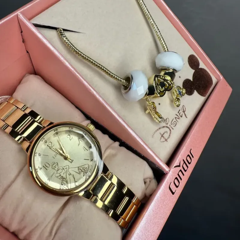 RELOGIO CONDOR FEMININO LINHA DISNEY DOURADO COM FUNDO CINDERELA ACOMPANHA ACESSORIOS PULSEIRA COM BERLOQUES PERSONALIZADO PERSONAGEM CO2035NMW/K4X - COR AÇO DOURADO RELOGIO CONDOR FEMININO LINHA DISNEY DOURADO COM FUNDO CINDERELA ACOMPANHA ACESSORIOS PULSEIRA COM BERLOQUES PERSONALIZADO PERSONAGEM CO2035NMW/K4X - COR AÇO DOURADO