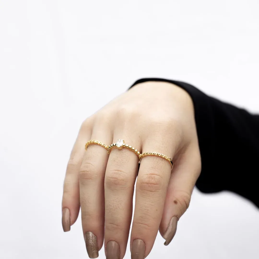 ANEL SOLITÁRIO ZIRCONIA OVAL ARO COM DETALHES EM BOLINHAS  Nº21  - BANHADO A RÓDIO BRANCO