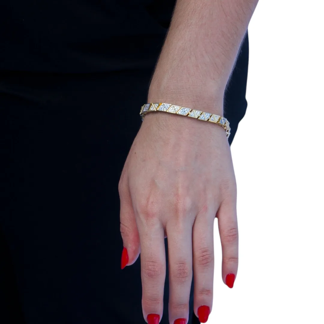 PULSEIRA TRIANGULOS COM MICRO ZIRCONIA CRISTAL E APLICAÇÃO DE RODIO BRANCO COM FECHO GAVETA- BANHADO A OURO 18K