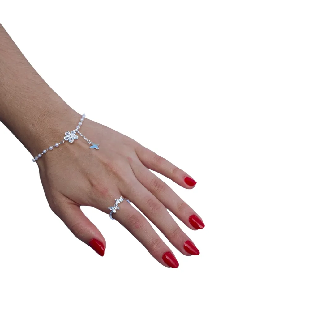 PULSEIRA PÉROLA COM FLOR EM NAVETE CRISTAL E BORBOLETA LISA PENDURADA E EXTENSOR - BANHADO A PRATA 925