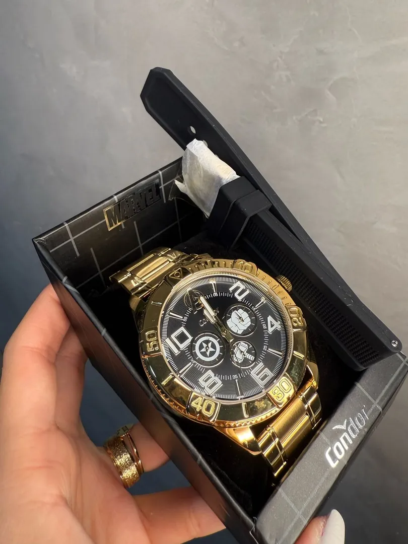 RELOGIO CONDOR MARVEL MASCULINO DOURADO COM FUNDO PRETO ACOMPANHA PULSEIRA EXTRA BORRACHA DE BRINDE CO6P29JOX/T4A - COR AÇO DOURADO