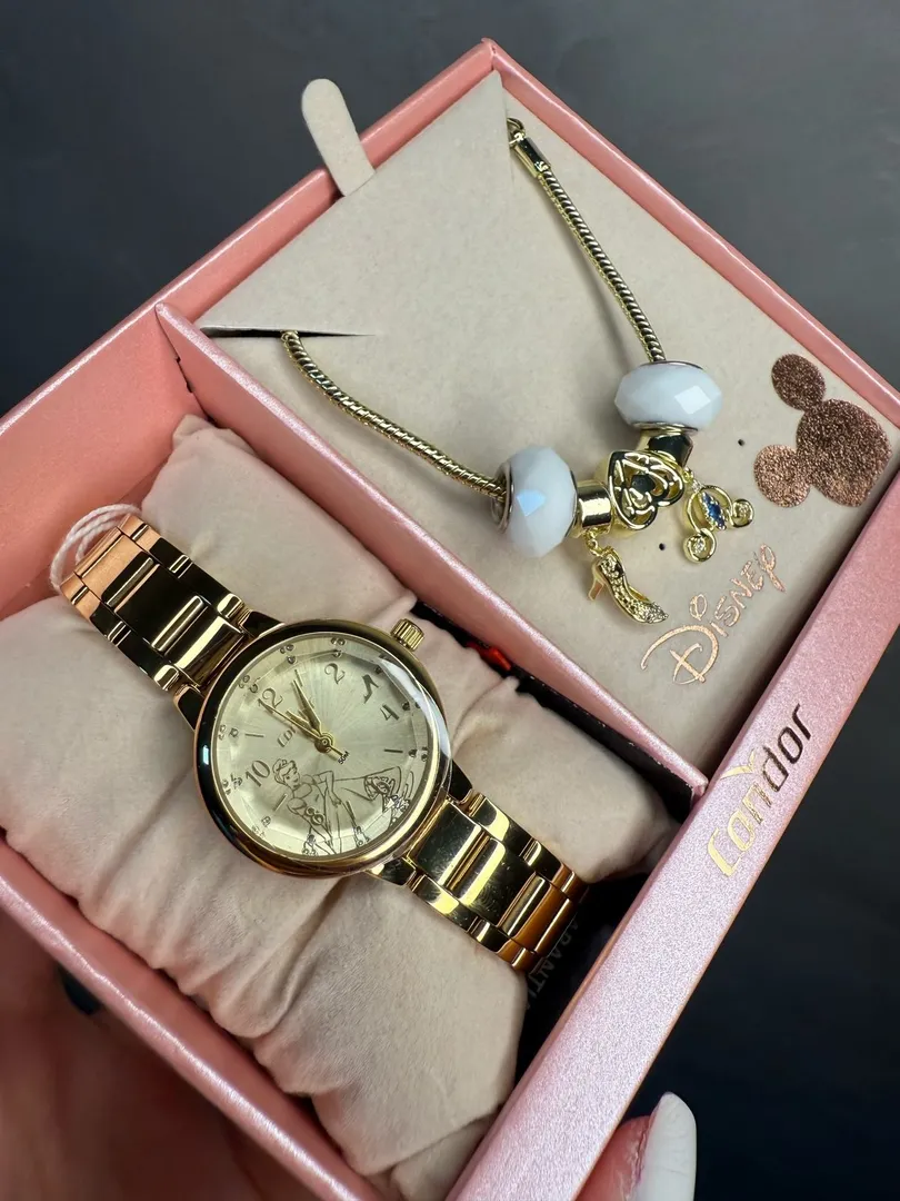 RELOGIO CONDOR FEMININO LINHA DISNEY DOURADO COM FUNDO CINDERELA ACOMPANHA ACESSORIOS PULSEIRA COM BERLOQUES PERSONALIZADO PERSONAGEM CO2035NMW/K4X - COR AÇO DOURADO