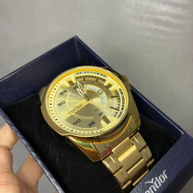 RELOGIO CONDOR MASCULINO DOURADO PULSEIRA BLOCO COM FUNDO DOURADO E DATA C02115MWG/4X- COR AÇO DOURADO
