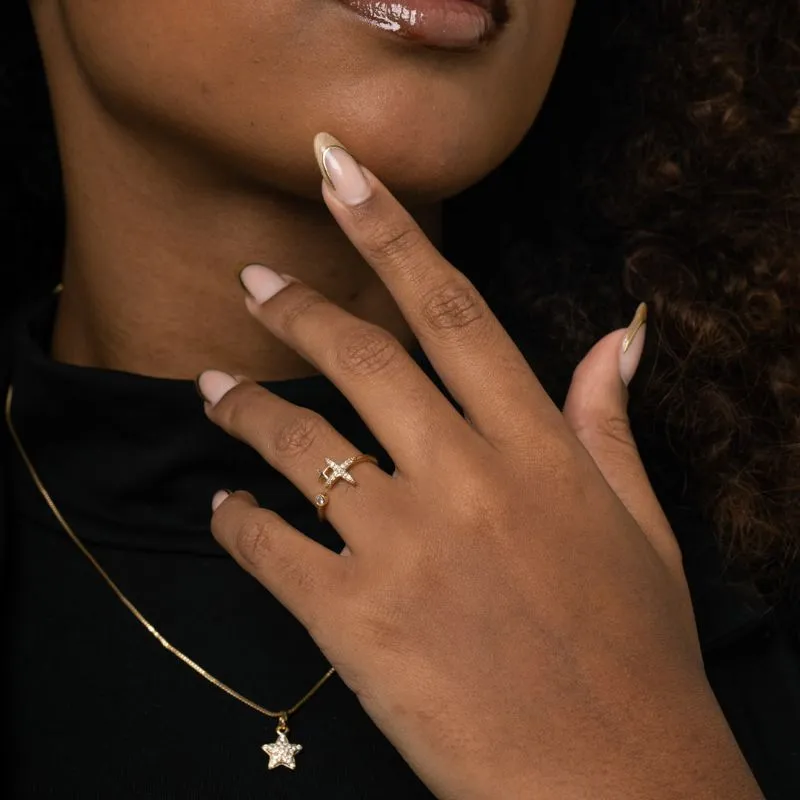 ANEL REGULÁVEL ESTRELA DUPLO COM MICRO ZIRCÔNIA CRISTAL - BANHADO A OURO 18K