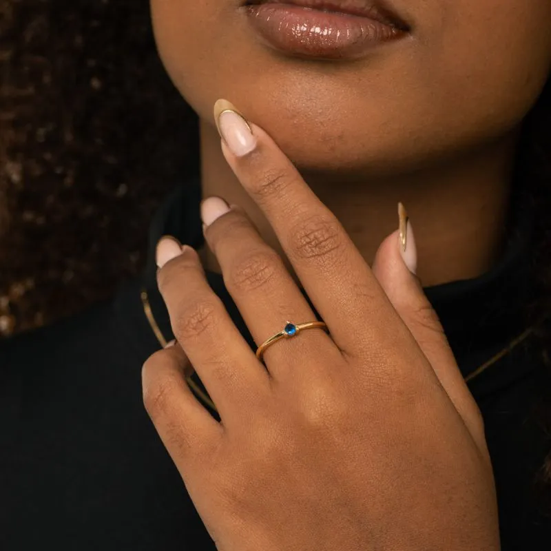 ANEL SOLITARIO 3 GARRAS COM PONTO DE LUZ ZIRCÔNIA AZUL Nº16 - BANHADO A OURO 18K