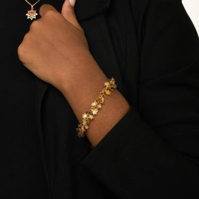 PULSEIRA COM MINI FLOR EM TODAS A VOLTA- BANHADO A OURO 18K