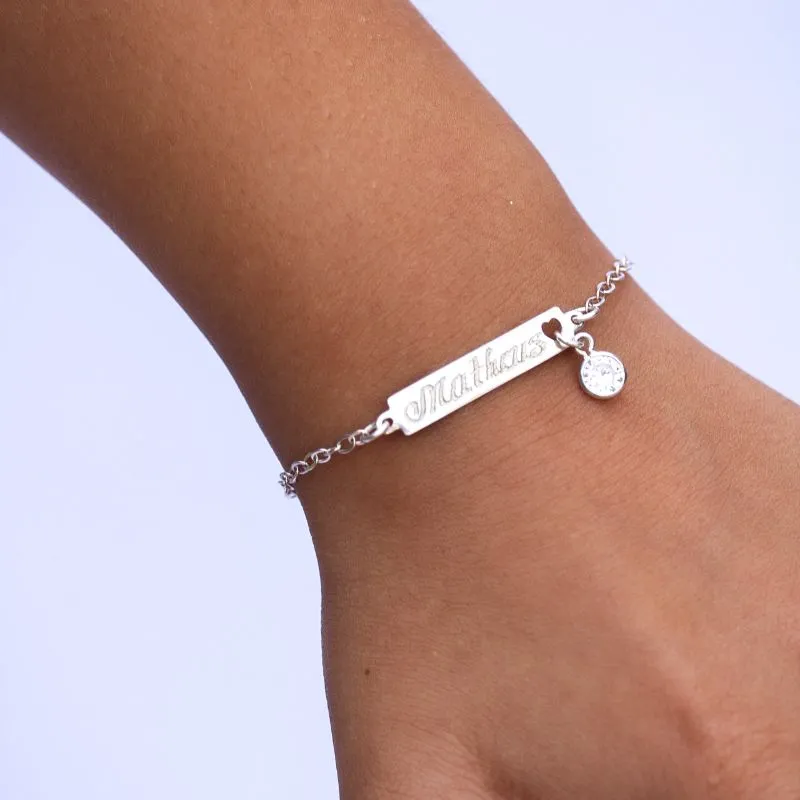 PULSEIRA INFANTIL PLACA LISA COM CORAÇÃO VAZADO E PINGO DE LUZ PENDURADO ELO PORTUGUES FINO  COM NOME MATHEUS- PRATA 925