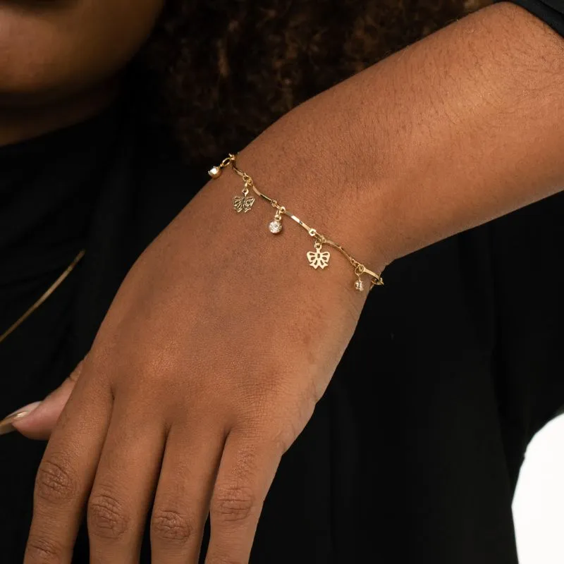 PULSEIRA PALITO COM PENDURICALHO LAÇO VAZADO LISO  E PONTO DE LUZ COM EXTENSOR  - BANHADO A OURO 18K