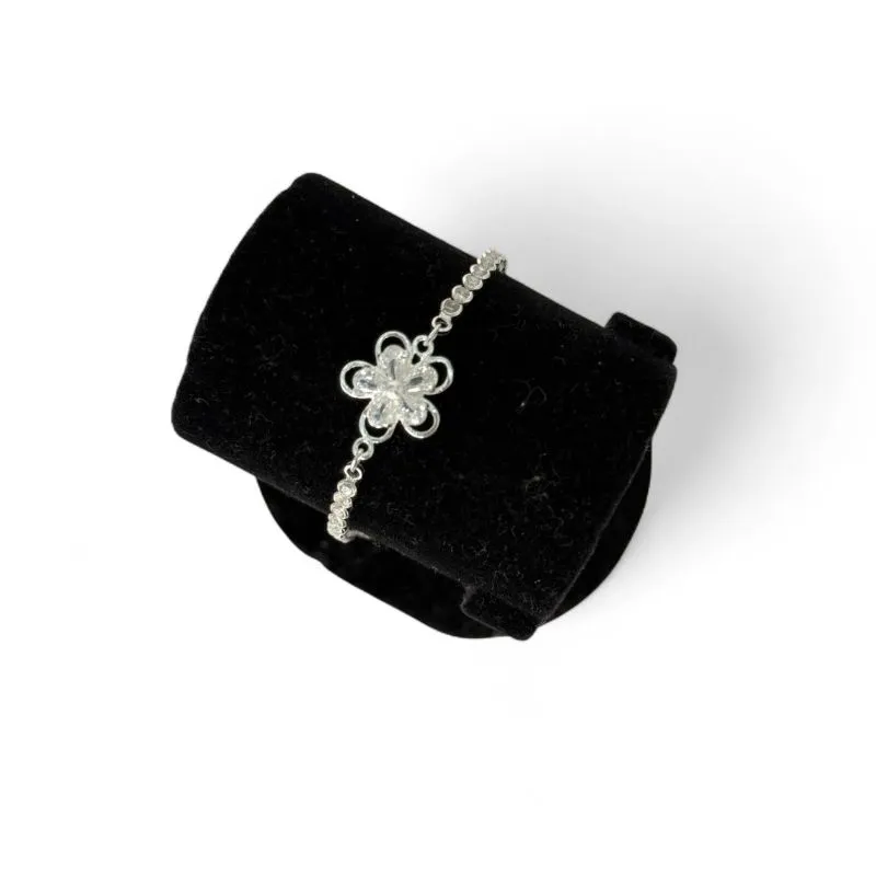 PULSEIRA RIVIERA ZIRCONIA CRISTAL REDONDA COM FLOR CENTRAL E EXTENSOR  - BANHADO A PRATA 925