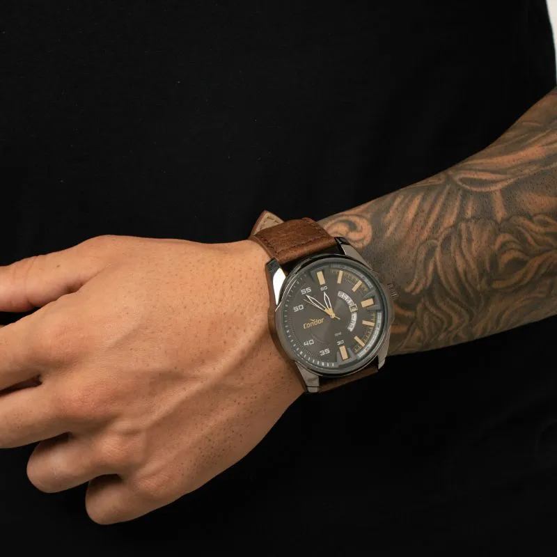 RELÓGIO CONDOR MASCULINO GRAFITE REDONDO COM FUNDO GRAFITE E DOURADO  E PULSEIRA EM COURO   - COR GRAFITE