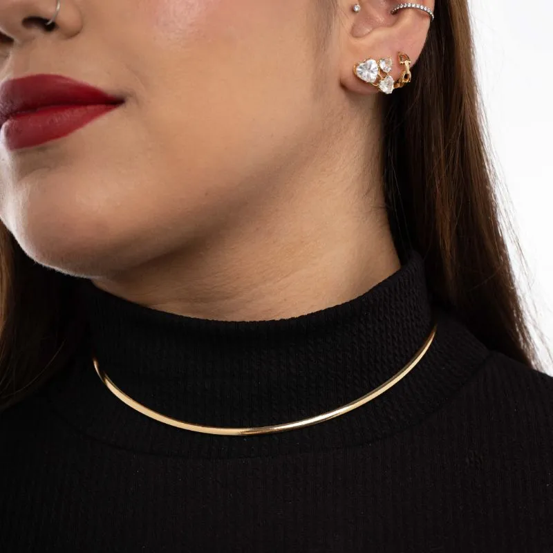 BRINCO FURO DUPLO COM CORAÇÕES CRISTAL- BANHADO A OURO 18K