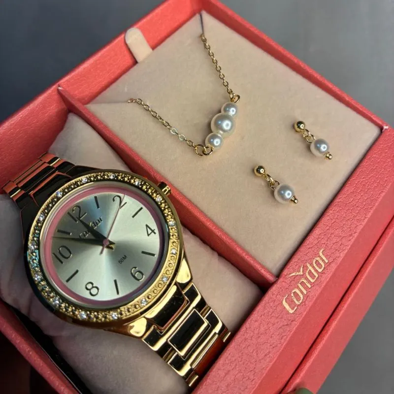 RELOGIO CONDOR FEMININO PULSEIRA GOMO LATERAL EM ZIRCÔNIA CRISTAL E FUNDO METÁLICO COM ROSÉ - ACOMPANHA CONJUNTO DE BRINCO E CORRENTE  CO2035NEJ/K4D- COR AÇO DOURADO