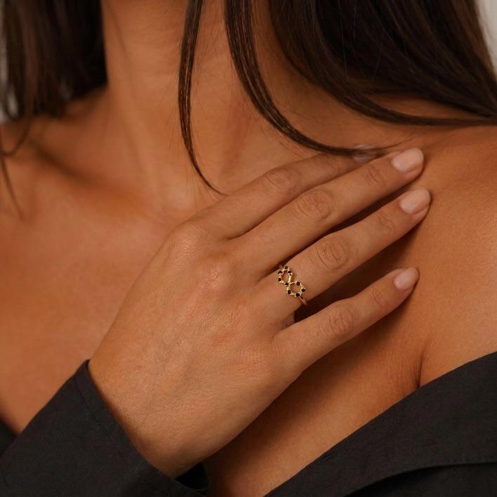 ANEL FALANGE SÍMBOLO DO INFINITO COM ZIRCONIA NEGRA REGULAVEL- BANHADO A OURO 18K