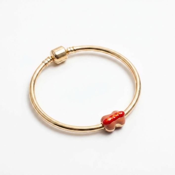 BERLOQUE SEPARADOR CACHORO QUENTE RESINADO - BANHADO A OURO 18K