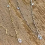 CORRENTE ELO PORTUGUÊS EXTRA FINO COM PONTO DE LUZ PENDURADO E GOTA  CRISTAL - BANHADO A PRATA 925