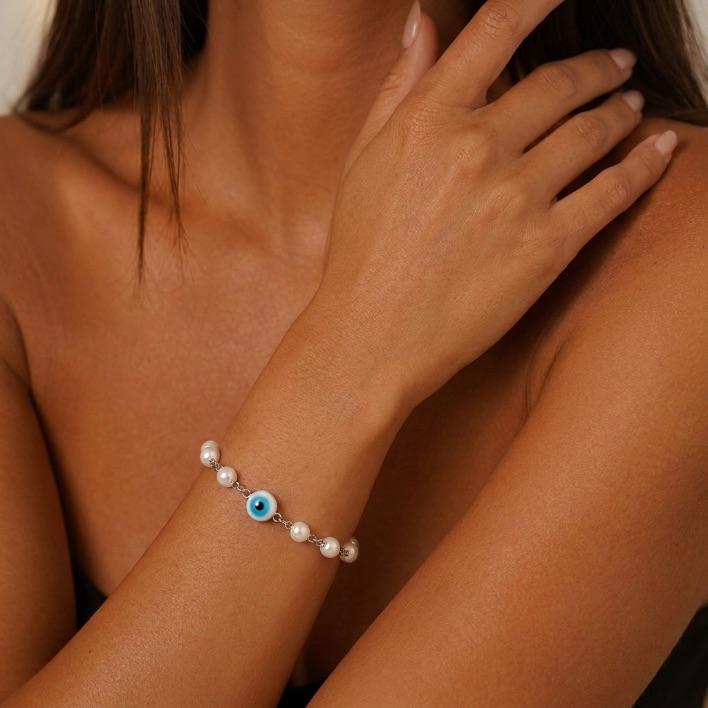 PULSEIRA PÉROLA INTEIRA COM OLHO GREGO  - BANHADO A RÓDIO BRANCO