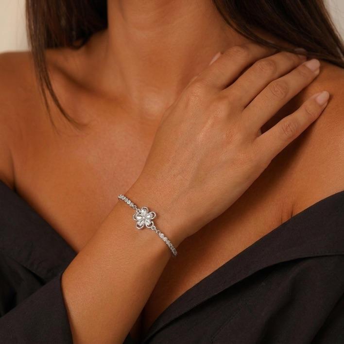 PULSEIRA RIVIERA ZIRCONIA CRISTAL REDONDA COM FLOR CENTRAL E EXTENSOR  - BANHADO A PRATA 925