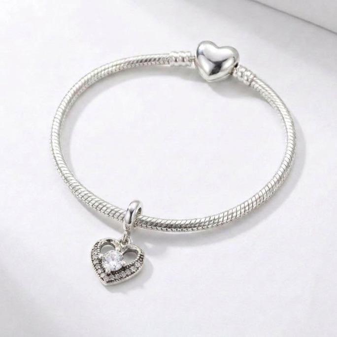 BERLOQUE PENDURADO CORAÇÃO VAZADO COM ZIRCONIA CRISTAL-PRATA 925