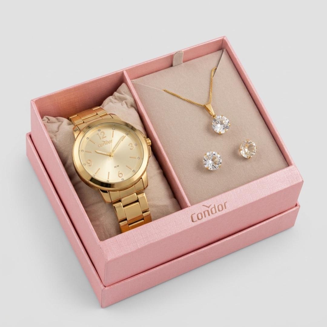 RELOGIO CONDOR FEMININO PULSEIRA GOMO E FUNDO DOURADO COM PONTO DE LUZ ZIRCONIA - ACOMPANHA CONJUNTO DE BRINCO E CORRENTE  CO2035NAU/K4X  COR AÇO DOURADO